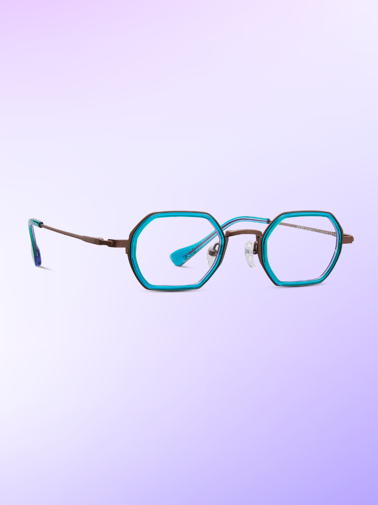 A pair of geometric eyeglasses with blue frames and thin metal arms, displayed on a light purple gradient background.
